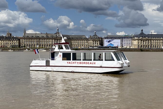 Prestige Commented Cruise glass of wine and Canelé in Bordeaux - The historic gate near the Garonne