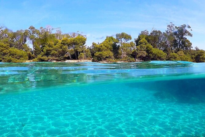 Private Boat Tour Cannes Lerins Islands - Swimming, snorkeling, and paddleboarding between the islands