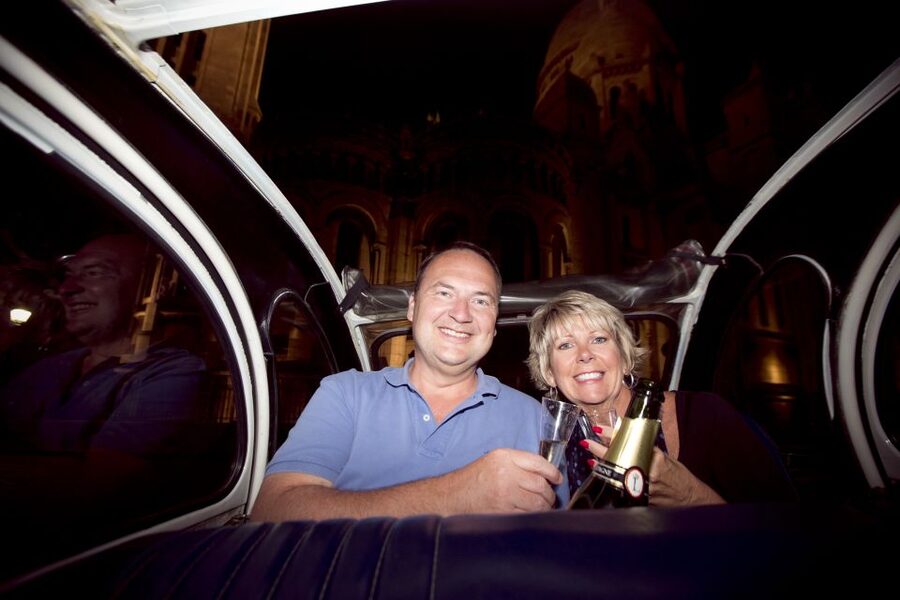 Private tour of Paris by Night with Champagne - The Louvre, Notre Dame, and Opera Garnier