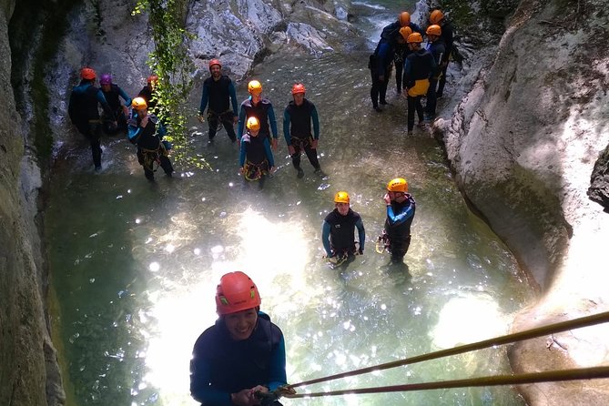 Sports Canyoning of Écouges bas in Vercors - Grenoble - Rappelling under a waterfall is the signature moment