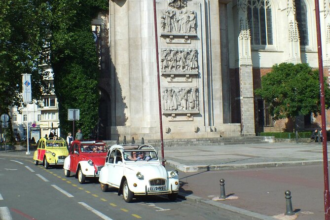 Unique Tour of Lille by Convertible 2CV - 1h00 - Place Rihour and the Palace setting
