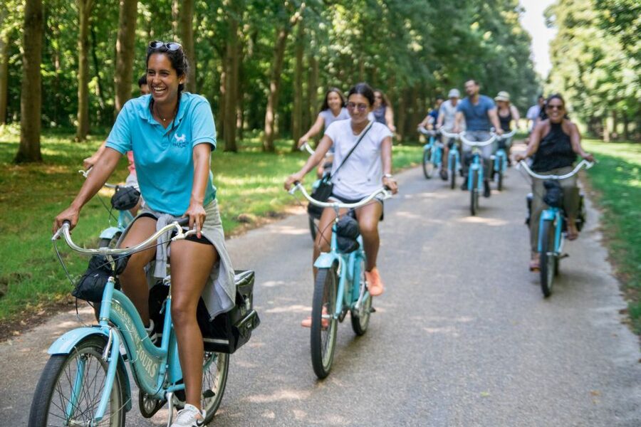 Versailles Bike Tour with Palace & Queen Farm Entrance - A picnic beside the canal