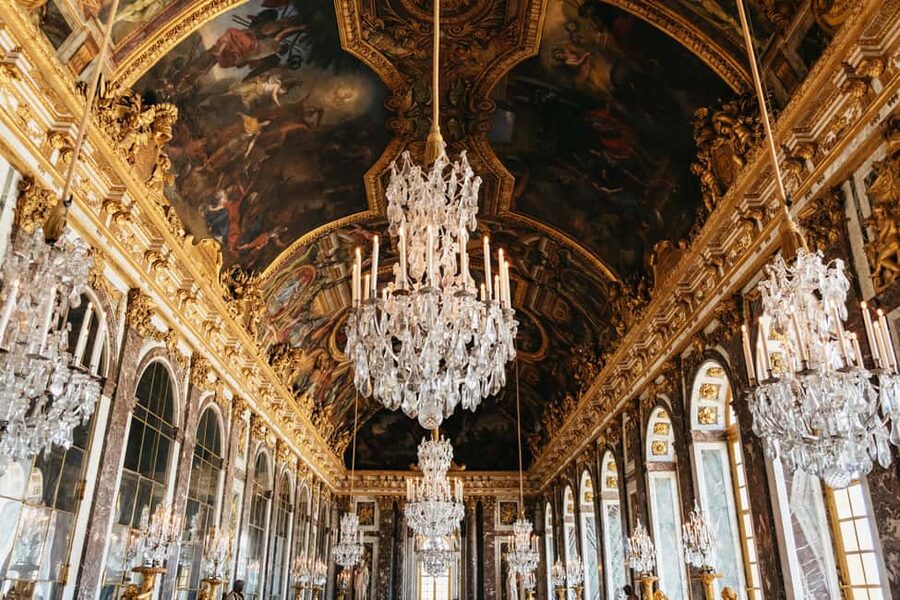 Versailles: Palace, Gardens & Marie Antoinette’s Estate Tour - Walking the formal gardens