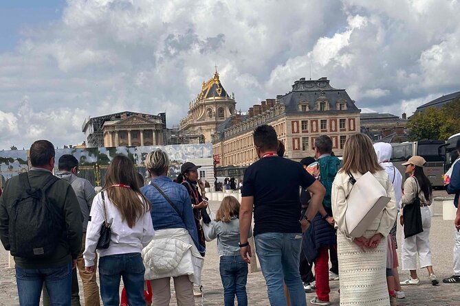 Versailles Palace Guided Tour with Gardens Access - Headsets, crowds, and the pace inside