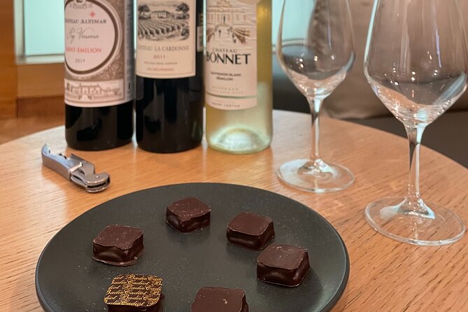 Wine Masterclass & Cheese Tasting Workshop in Bordeaux - Cheese, bread, and chocolate on the table